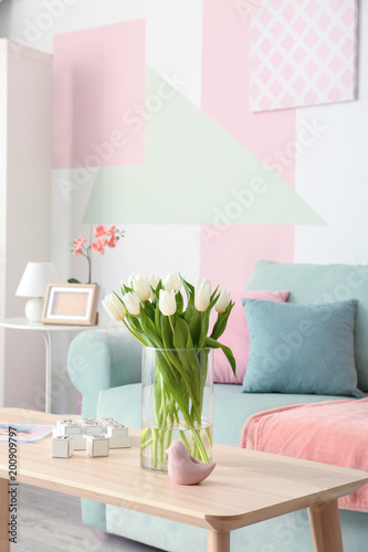 Wooden table with bouquet o...