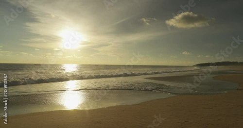 Exotic view of Pangumbahan beach with white sand on dusk time at Ujung Genteng, Sukabumi, West Java, Indonesia. Shot in 4k resolution photo