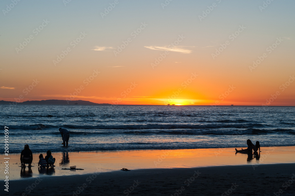 golden beach sunset on Huntington beach in southern California