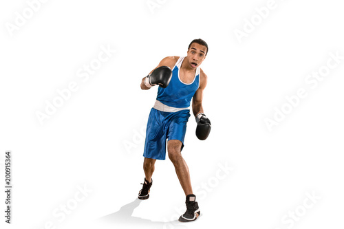 Fototapeta Naklejka Na Ścianę i Meble -  Sporty man during boxing exercise. Photo of boxer on white background