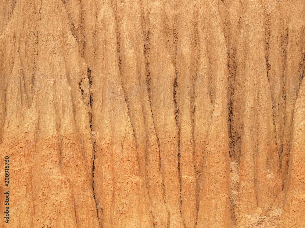 Naklejka premium Red soil texture background