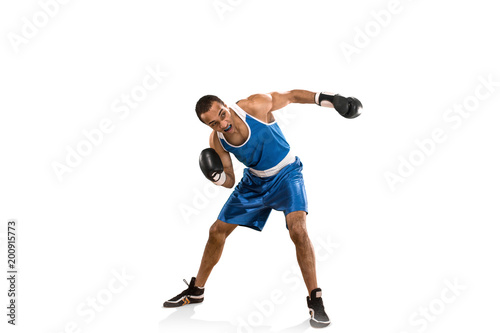 Sporty man during boxing exercise. Photo of boxer on white background © master1305