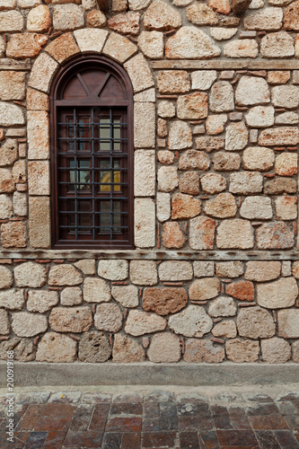 Window on old stone wall