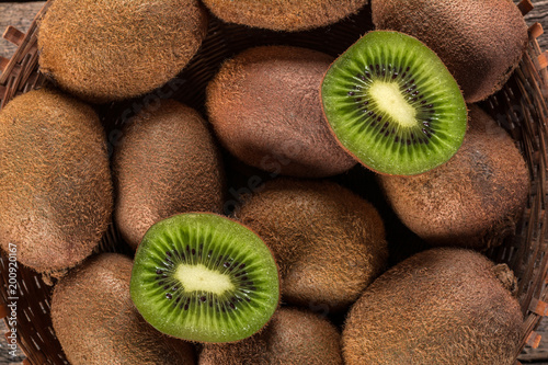 Kiwi fruits on wooden background
