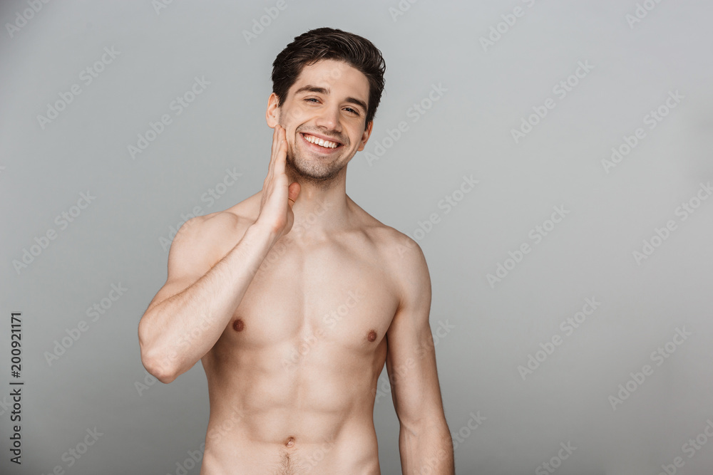 Fototapeta premium Beauty portrait of half naked smiling young man