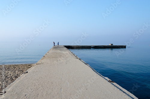 Fototapeta Naklejka Na Ścianę i Meble -  Old pier in Nea Kallikratia, Halkidiki peninsula, Greece