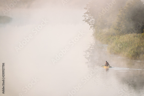 Calm Lake, River And Man Fishing From Old Wooden Rowing Fishing Boat