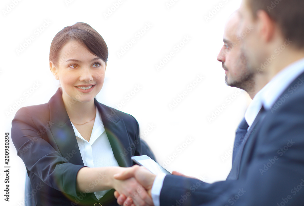 closeup of business woman shaking hands with her colleague. closeup of business woman shaking hands with her colleague.