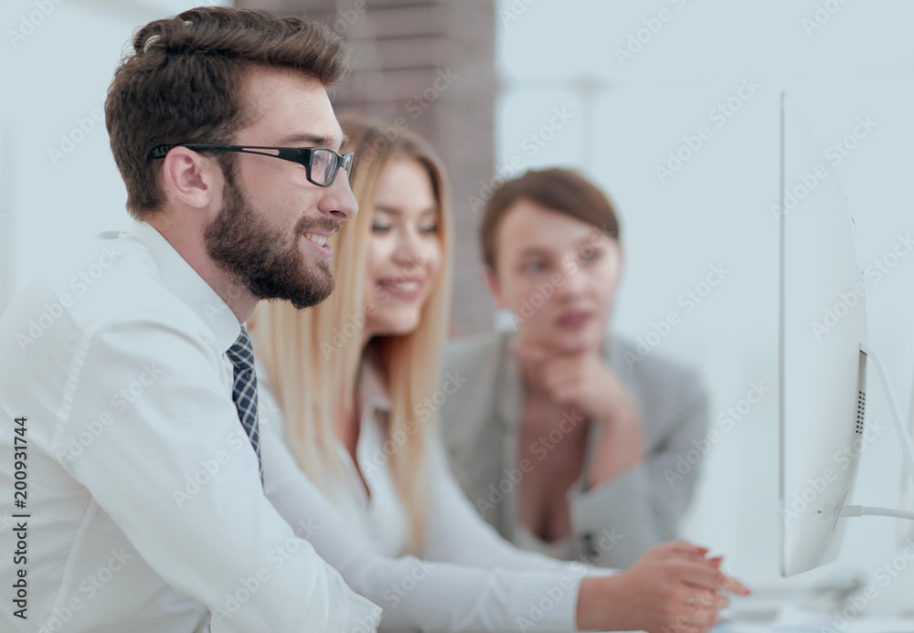 background image of a business team at a Desk. background image of a business team at a Desk.