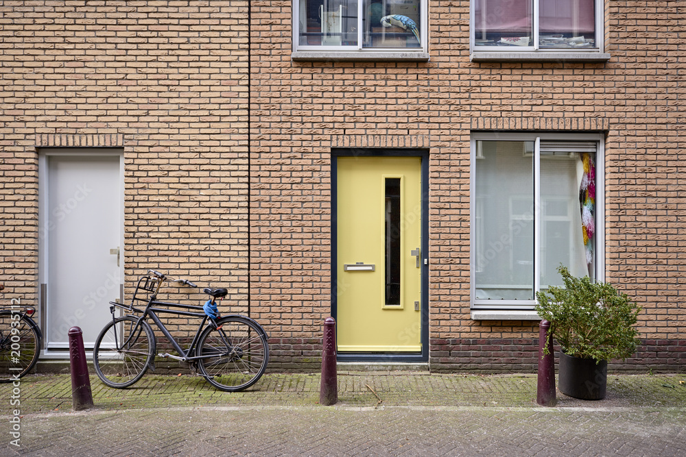 an old brick building with a bicycle