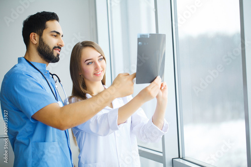 Male and female doctors work together in hospital