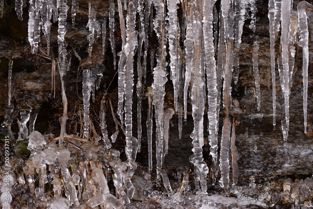 Icicles on a broken shale wall. Icicles on a broken shale wall.
