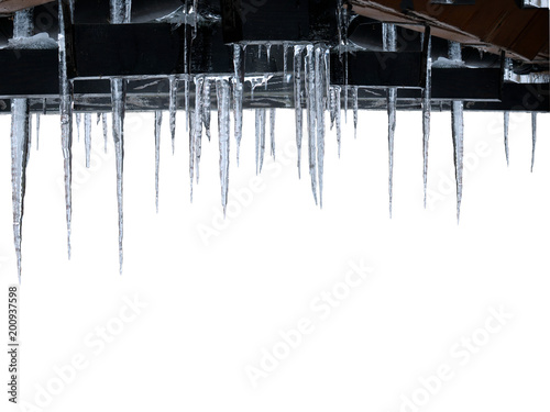 Icicles hanging from the roof. White background