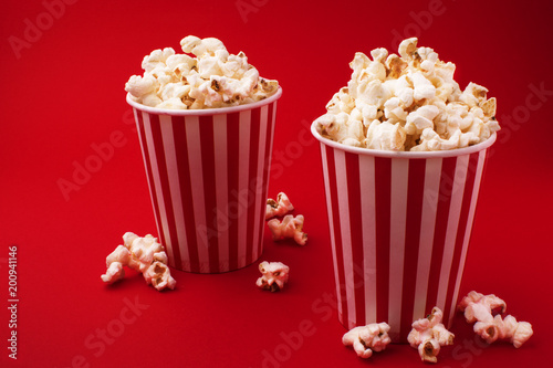 popcorn in two hollow boxes on a red background