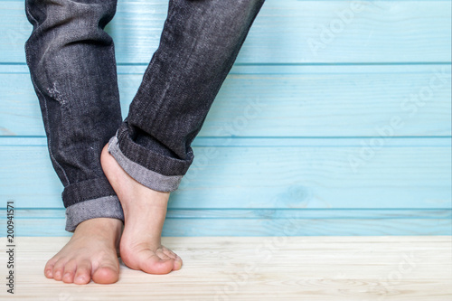 The legs of a little girl - fashionistas in black jeans