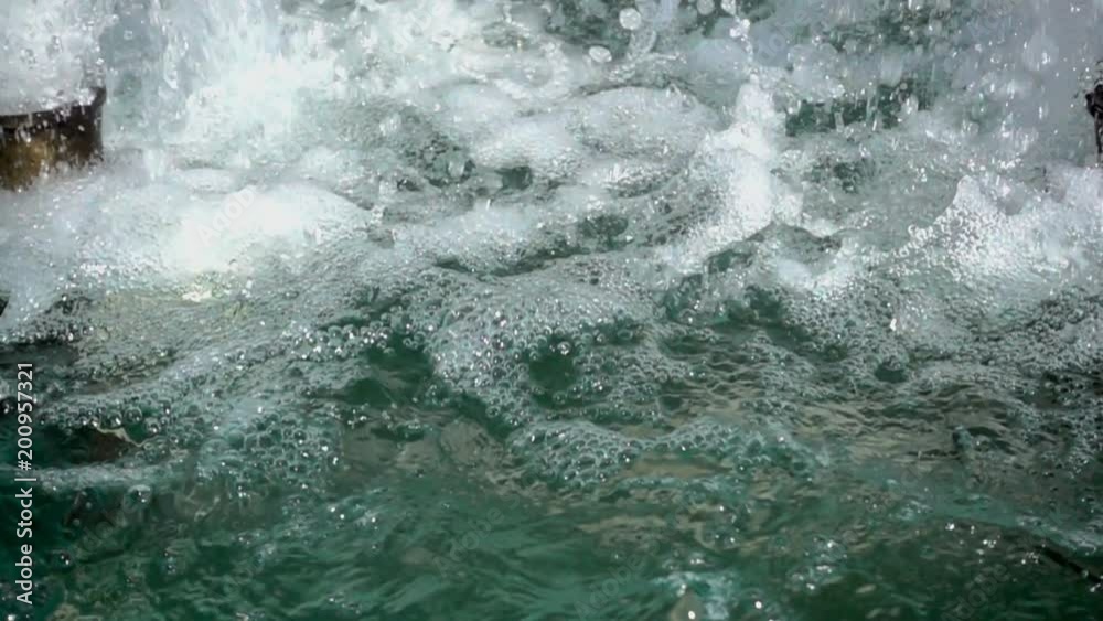 Slow motion splash of foam and water splashes abstract background. Slow motion splash of foam and water splashes abstract background.