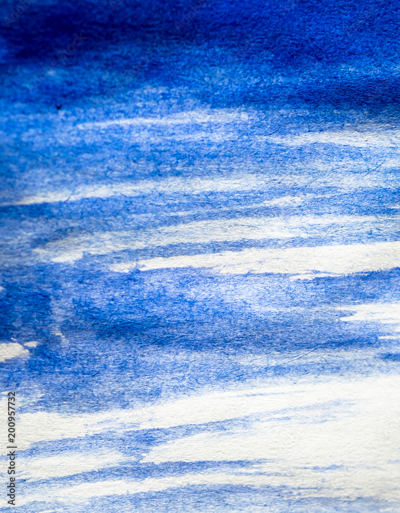 Obraz premium Texture of blue watercolour paint on white paper. Vertical background with stains of watercolor brush strokes.