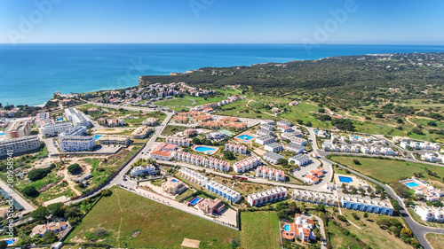 Aerial. Populated areas of the house and off the coast Armacao Pera, Alporchinhos. © sergojpg