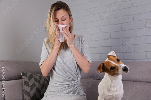 Man having pet allergy symptoms : runny nose, asthma photo
