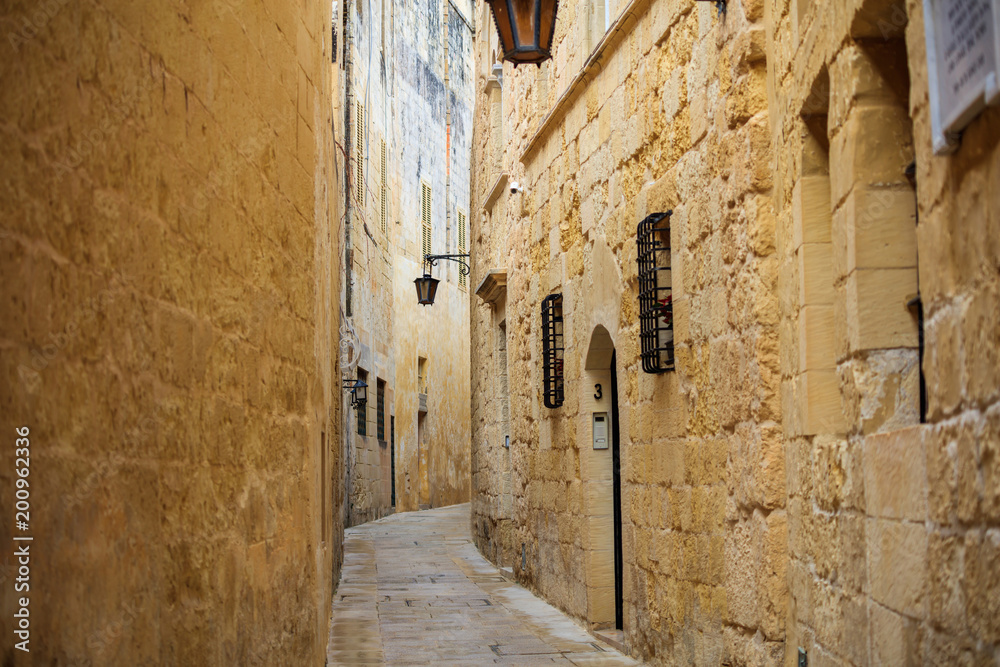 Malta, Mdina. Old medieval city narrow streets, houses sandstone facades