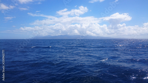 Opean Sea with island in the distance © Patrick