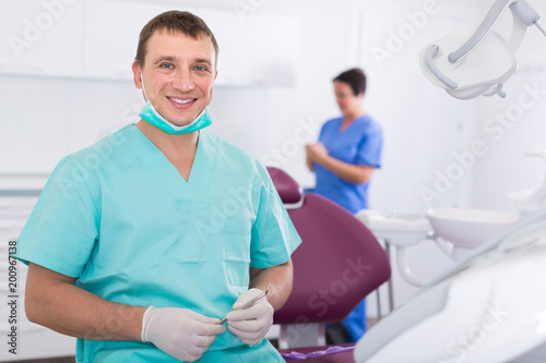Adult doctor dentist in uniform