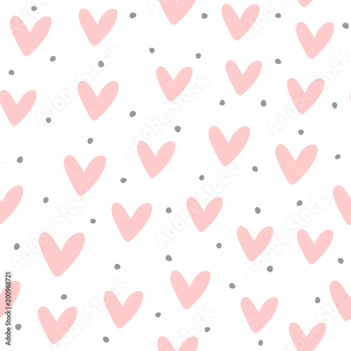 Cute seamless pattern with repeating hearts and round dots drawn by hand. Endless girlish print.