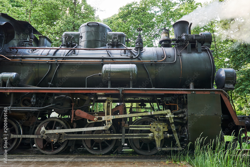 Fragment of mechanism old locomotive in Poland. Fragment of mechanism old locomotive in Poland.