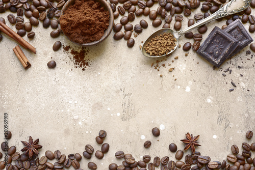 Ground coffee and coffee beans with spices.Top view with copy space.
