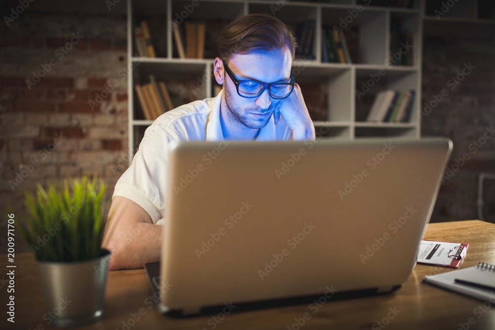 Young man with a laptop Young man with a laptop