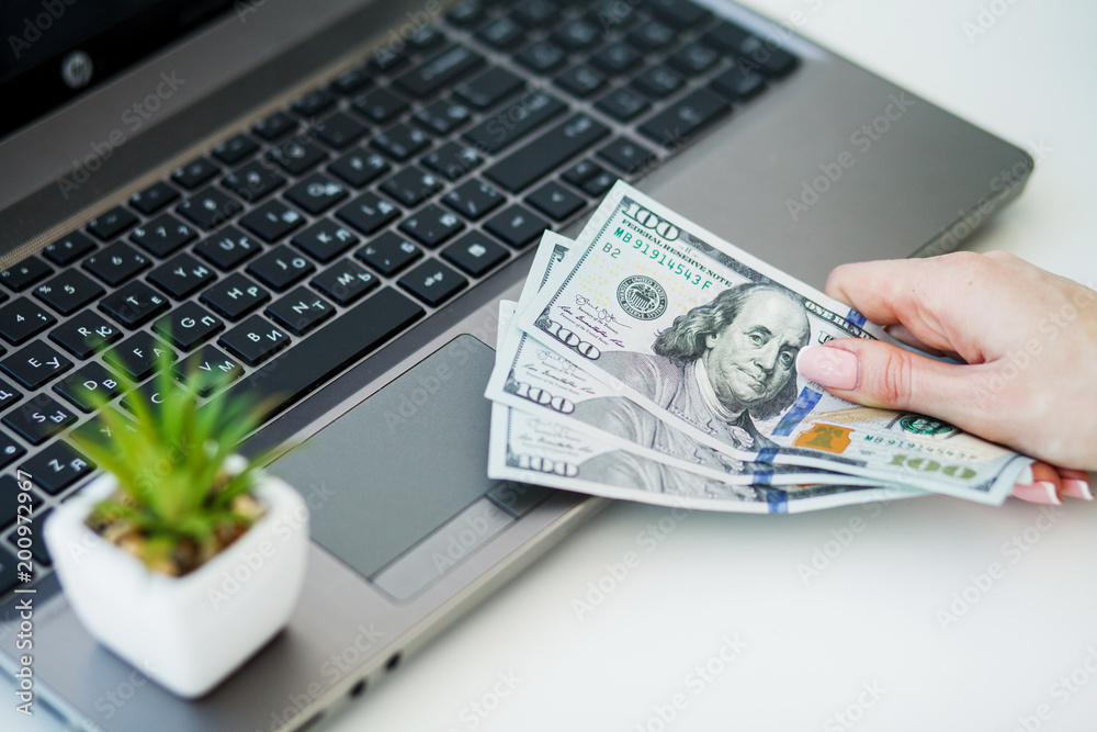 Woman With Money at Workplace. Business Concept. Woman With Money at Workplace. Business Concept.