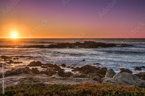 Colorful Sunset at Carmel Shore in California photo