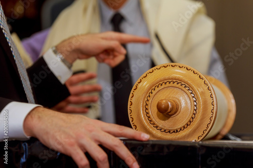 Classical Torah scrolls in religious services in a synagogue, especially during the holidays