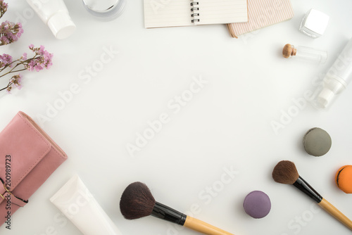 White cosmetic products and flower on white background. Natural beauty blank label for branding mockup concept.