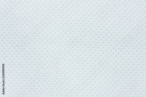 White perforated paper background