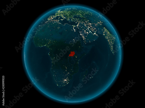 Fototapeta Naklejka Na Ścianę i Meble -  Uganda on planet Earth in space at night
