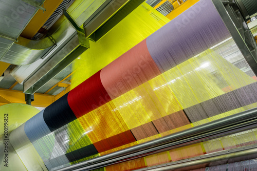 Fotografija weaving loom at a textile factory, closeup