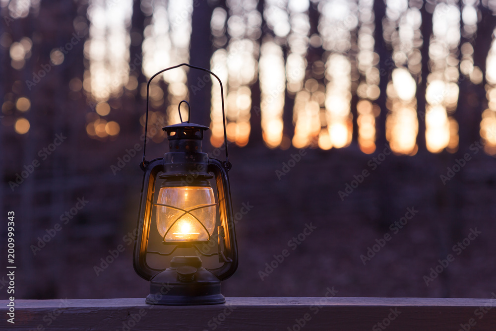 Old fashioned lantern in darkness - obrazy, fototapety, plakaty 