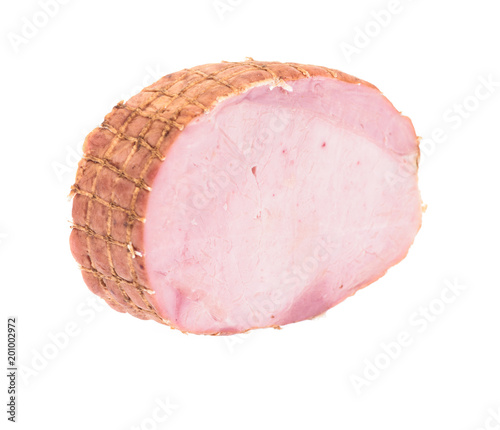 Piece of home made pork ham isolated on white background.