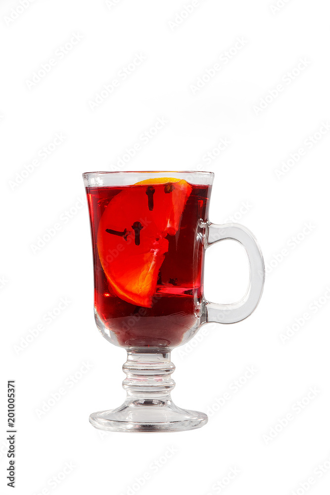 Monochrome transparent cocktail, red mulled wine in a high glass with a handle with spices and a slice of lemon, orange. Side view. Isolated white background. Drink for the menu restaurant, bar, cafe Monochrome transparent cocktail, red mulled wine in a high glass with a handle with spices and a slice of lemon, orange. Side view. Isolated white background. Drink for the menu restaurant, bar, cafe