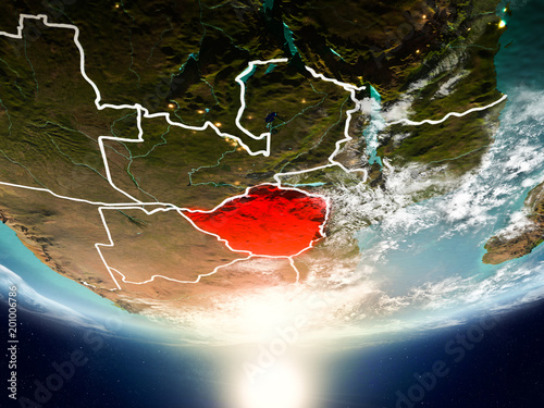 Zimbabwe with sun on planet Earth