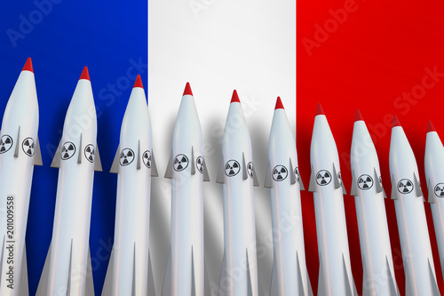 Nuclear missiles in a row and flag of France
