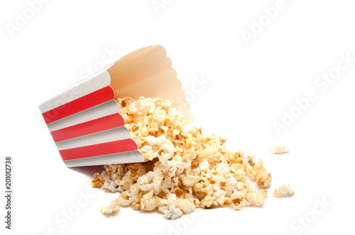 Popcorn is food for cinema in color box on the white