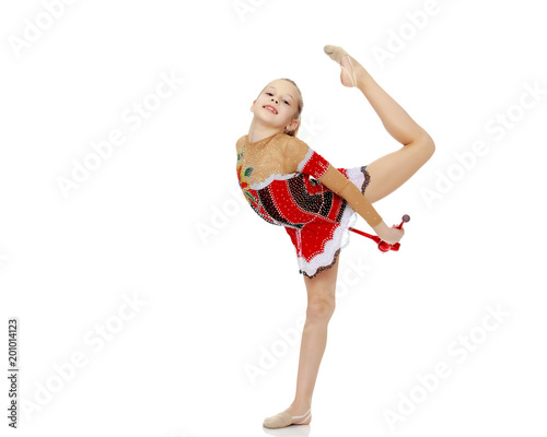 Gymnast performs exercises with a Mace.