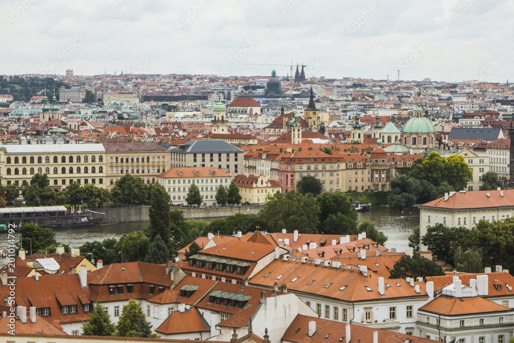 View of the Old Town of Prague from a high point. Red roofs, historical architecture. Czech Republic