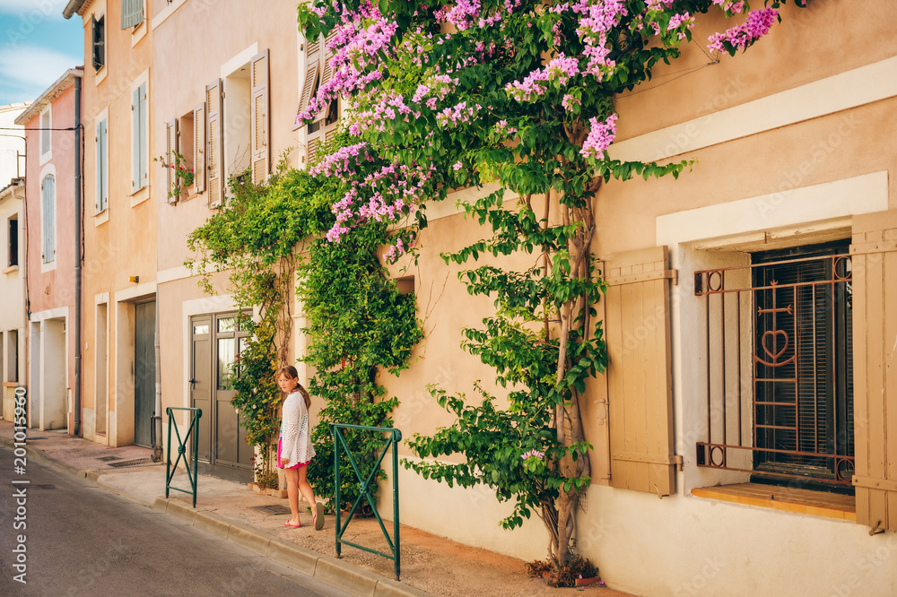 Fototapeta premium Cute little kid girl on summer vacation in Camargue, France