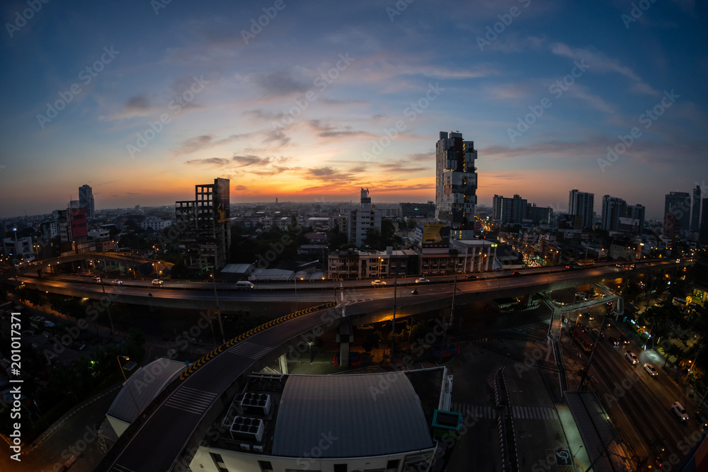 Morning in Bangkok Sky with office building and traffic road