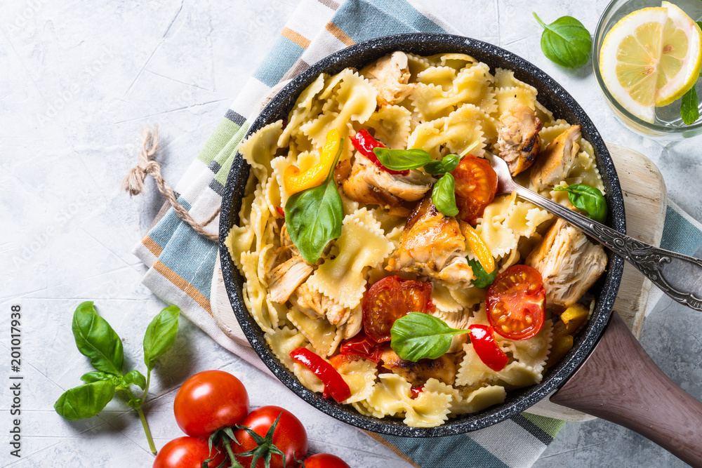 Pasta with chicken and vegetables top view. Pasta with chicken and vegetables top view.