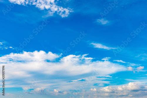 Blue sky background with tiny clouds on season summer. © prakhob_khonchen