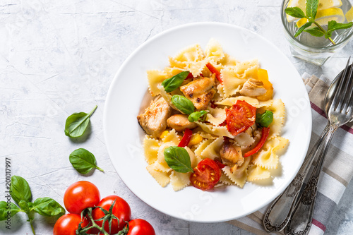 Pasta with chicken and vegetables. Close up.